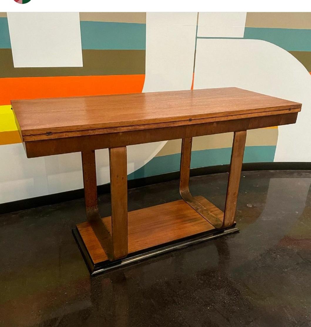 Refinished desk attributed to Donald Deskey. It's doubles as a table as shown in the pictures.