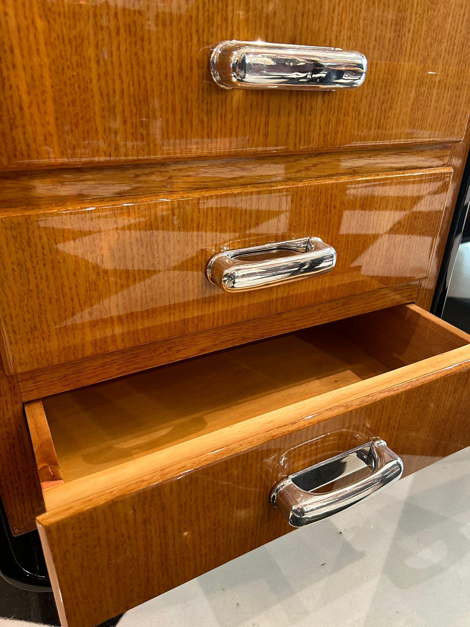 The 'Bocconi' desk and chair, designed by Giuseppe Pagano Pogatschnig in 1939, have been fully refurbished, restoring them to their original splendor. The desk and chair have been refinished with a fresh lacquer, enhancing their sleek, modernist