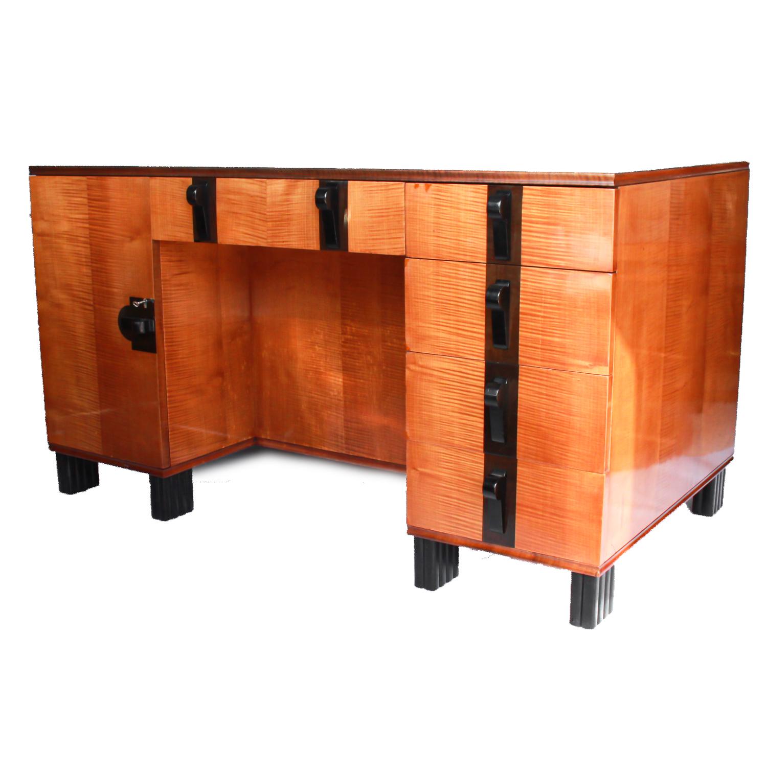 An Art Deco, Maurice Adam satin wood and ebony desk. Original handles with ebony banding too front. Original ebony fluted feet.


 