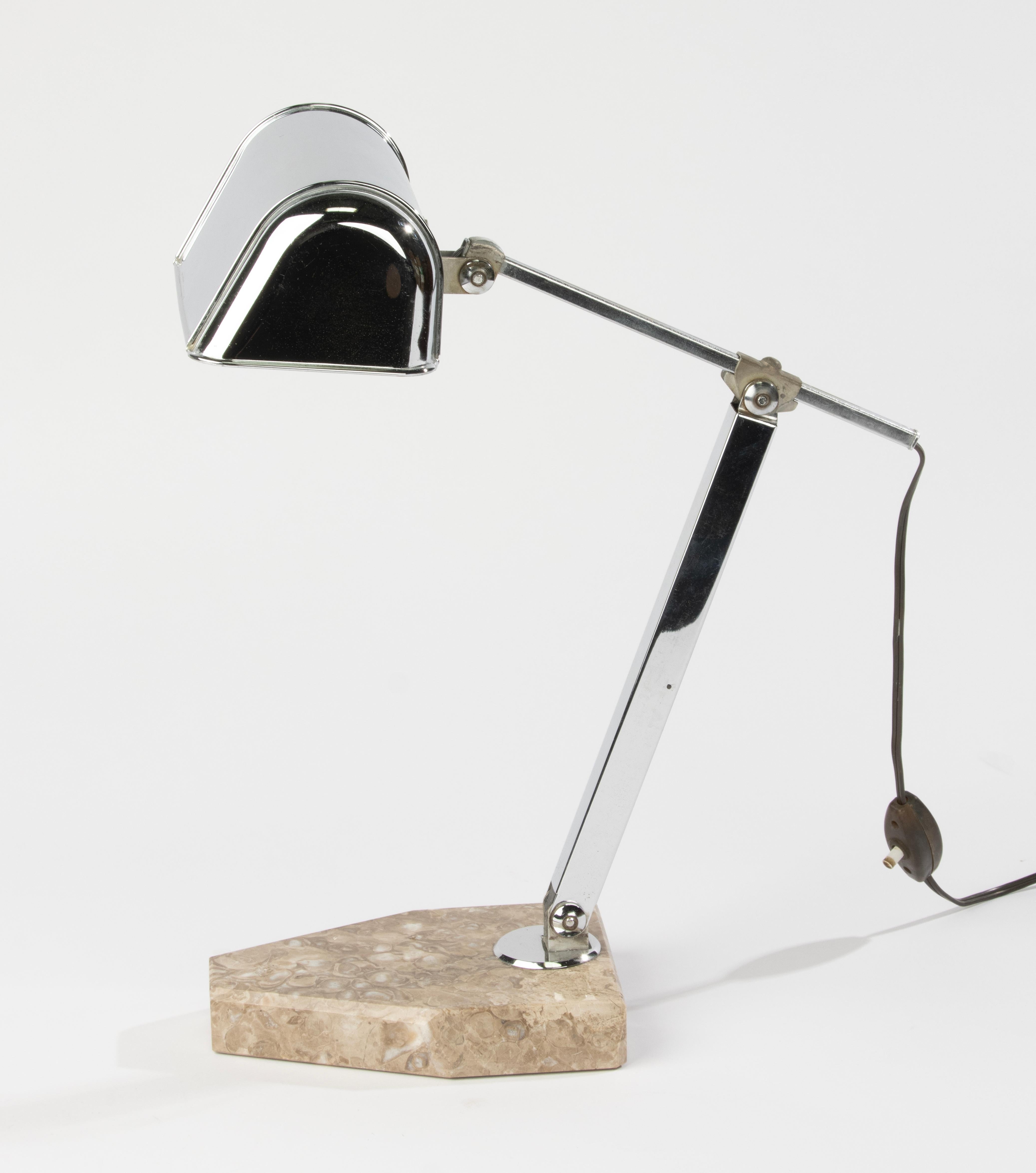 Elegant and functional, this 1930s Art Deco desk lamp by Fare features a sleek chrome-plated adjustable arm and shade, with a solid beige marble base. A classic example of early modern design, it offers both sculptural beauty and practical lighting.