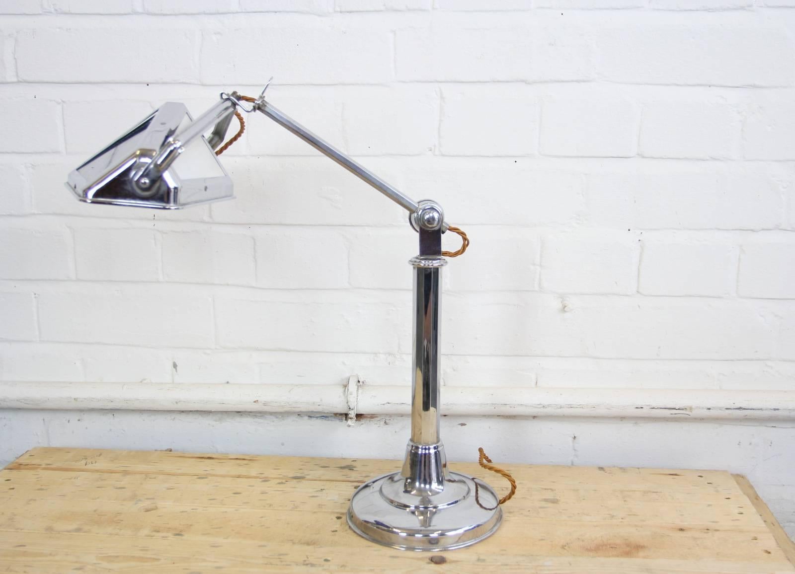 Art Deco desk Lamp by Pirouette, circa 1920s 

Product code #OA521

- Chrome base and arm
- Cobalt blue and opaline glass 
- Takes B22 fitting bulbs
- Adjustable shade and arm
- French, circa 1920s
- Measures: 25cm wide x 16cm deep x 53cm