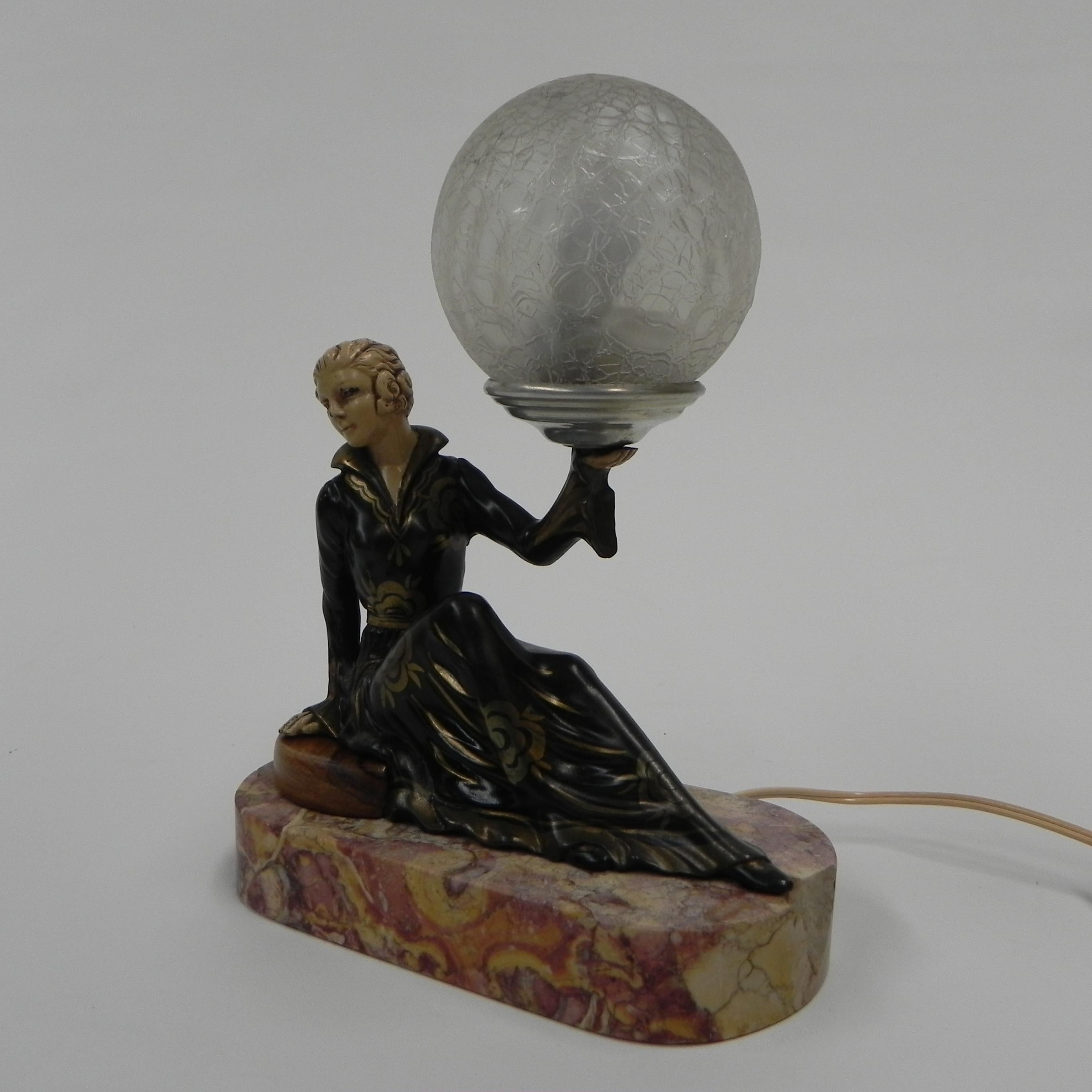 Early 20th Century Art Deco desk lamp sitting woman with globe For Sale