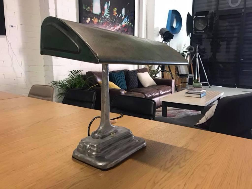 This is an original desk lamp of the 1930s. This has been cleaned, polished and re-wired to take a standard household bulb and is in good working order. In very good vintage condition and fully working.

Details:
- Era: Industrial/1930s
-