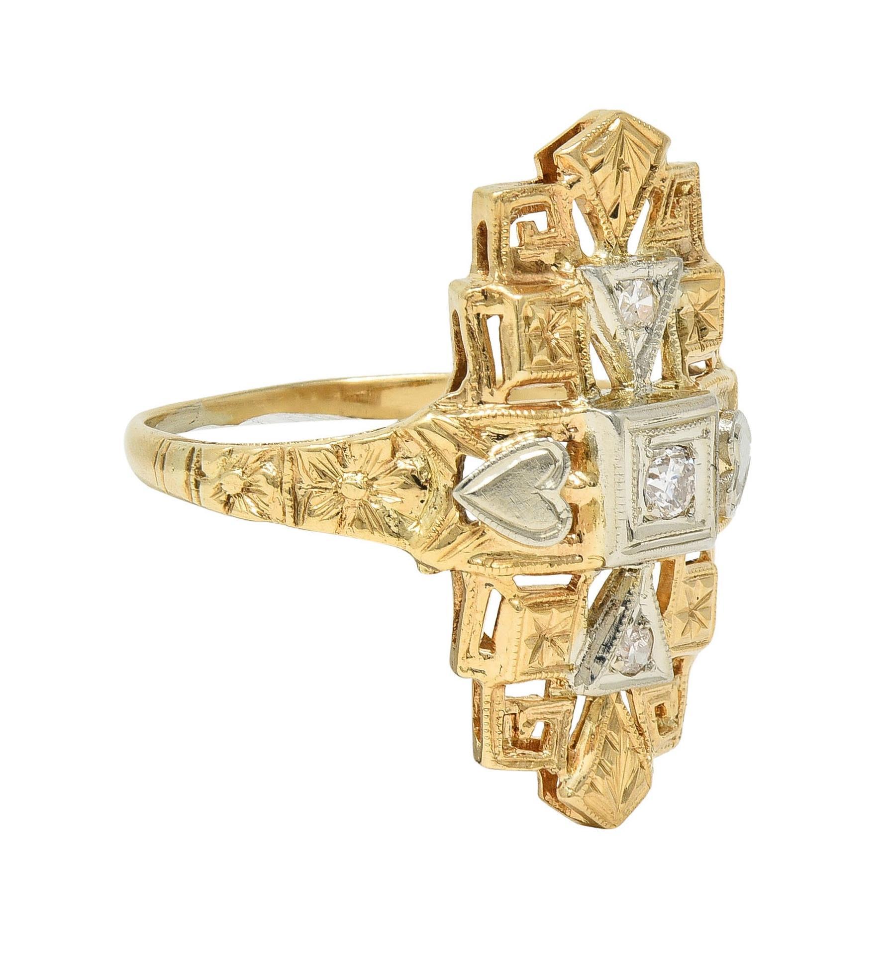 Designed as a pierced navette-shaped form with a tiered streamlined composition
Decorated with pierced Greek key and engraved orange blossom motifs
Centering a transitional cut diamond flanked by single cut diamonds
Weighing approximately 0.14 carat