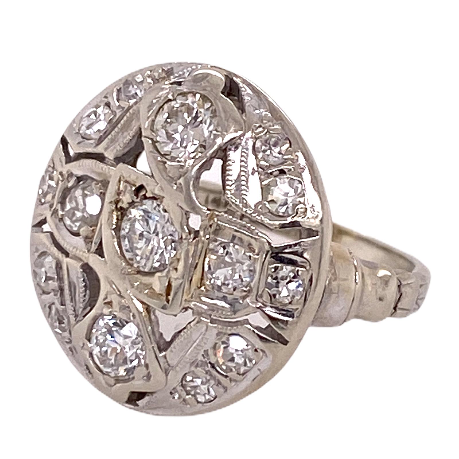 Original Art Deco diamond ring hand crafted in 14 karat white gold. The round top ring features 15 Old European Cut diamonds weighing approximately .85 carat total weight and graded G-H color and SI clarity. The top measures 17 x 17mm and is