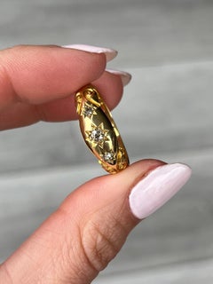 Art Deco Diamond and 18 Carat Gold Three-Stone Star Setting Band