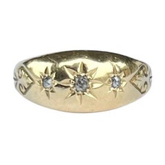 Art Deco Diamond and 18 Carat Gold Three-Stone Star Setting Band