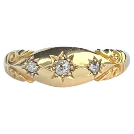 Art Deco Diamond and 18 Carat Gold Three-Stone Star Setting Band