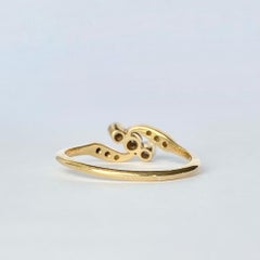 Art Deco Diamond and 18 Carat Gold Three-Stone Twist Ring