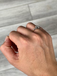 Art Deco Diamond and 18 Carat Gold Three-Stone Twist Ring