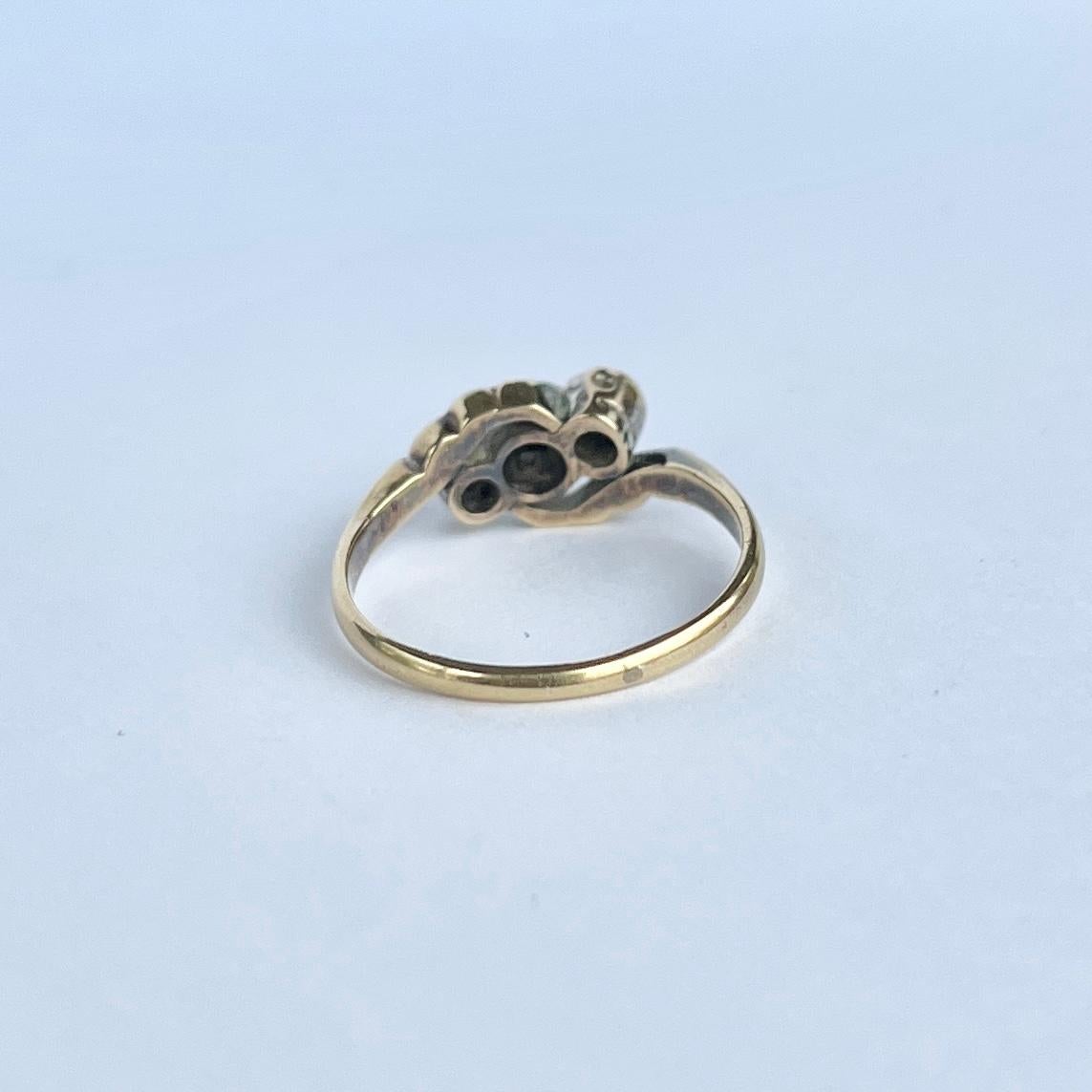 Art Deco Diamond and 18 Carat Gold Three-Stone Twist Ring In Good Condition For Sale In Chipping Campden, GB