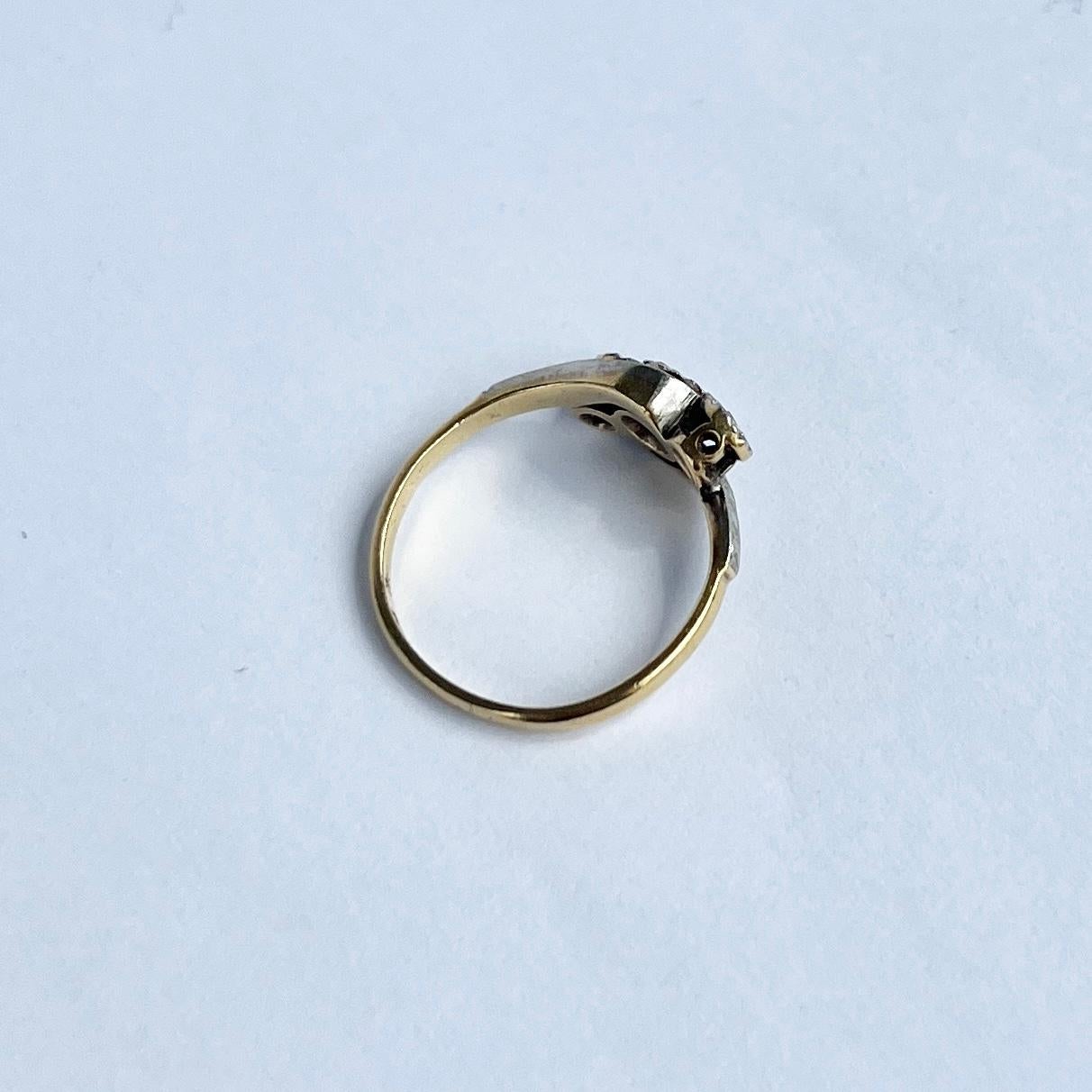Women's Art Deco Diamond and 18 Carat Gold Three-Stone Twist Ring For Sale