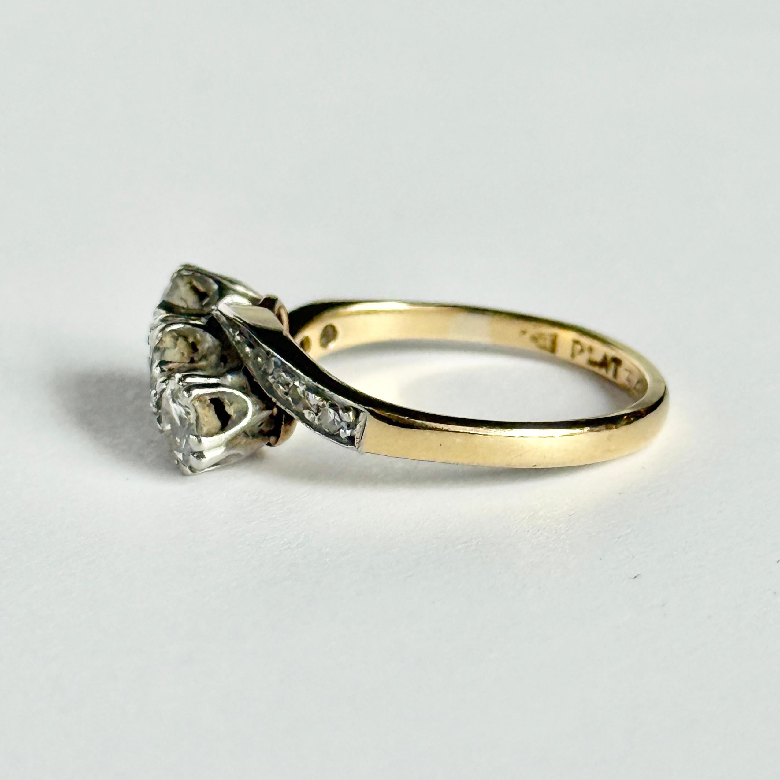 Women's Art Deco Diamond and 18 Carat Gold Three-Stone Twist Ring For Sale