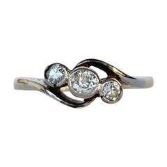 Art Deco Diamond and 18 Carat Gold Three-Stone Twist Ring Art Deco Diamond and 18 Carat Gold Three-Stone Twist Ring
