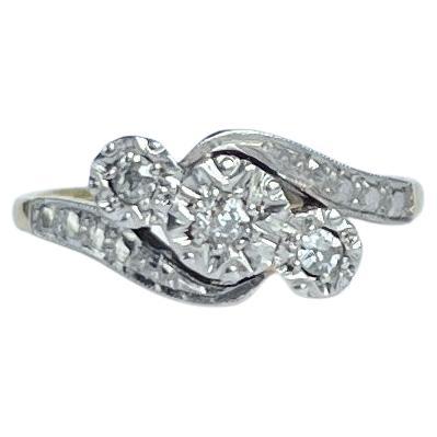 Art Deco Diamond and 18 Carat Gold Three-Stone Twist Ring
