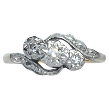 Art Deco Diamond and 18 Carat Gold Three-Stone Twist Ring