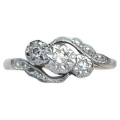 Art Deco Diamond and 18 Carat Gold Three-Stone Twist Ring