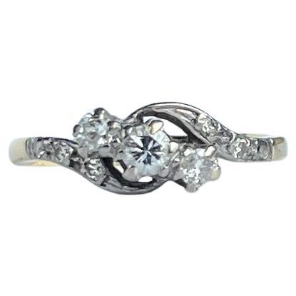 Art Deco Diamond and 18 Carat Gold Three-Stone Twist Ring
