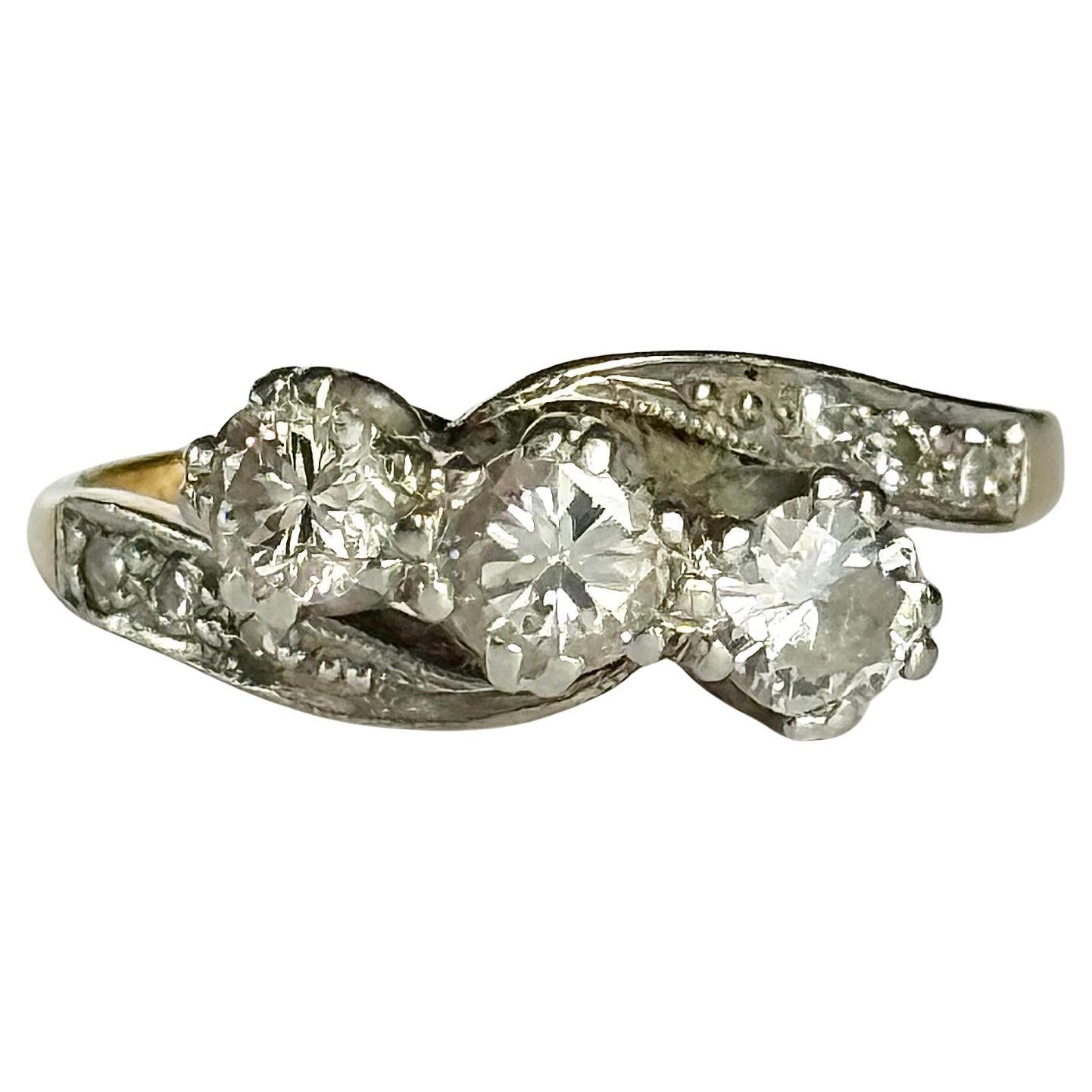 Art Deco Diamond and 18 Carat Gold Three-Stone Twist Ring For Sale
