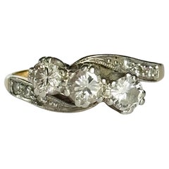Antique Art Deco Diamond and 18 Carat Gold Three-Stone Twist Ring