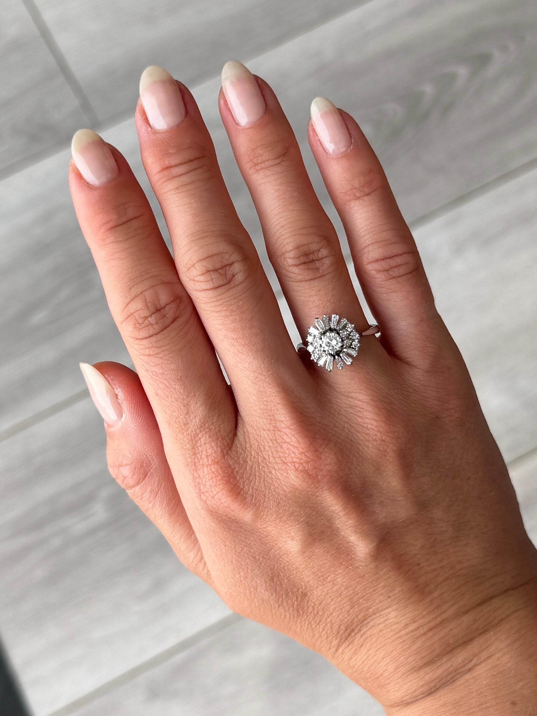 This stunning ring is vintage but created in an Art Deco style. It is modelled in 18carat white gold and the diamonds have a total weight of 45pts.

Size: M 1/2 or 6 1/2 
Panel Dimension: 13x12mm
Height Off Finger: 8mm

Weight: 4.6g

