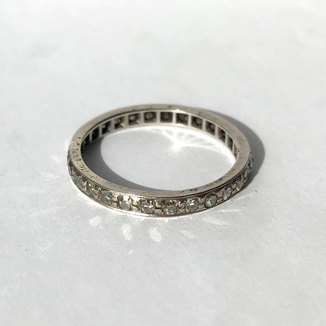 This classic diamond eternity would make a sparkly everyday wear or a fancy wedding band. Perfect to stack! The total weight of the old European cut diamonds is approx 30pts. 

Ring Size: N 1/2 or 7
Band Width: 2mm

Weight: 2.47g