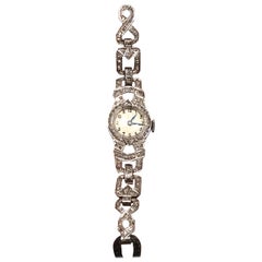 Orologio da polso da cocktail in oro bianco 18 carati e diamanti Art Deco