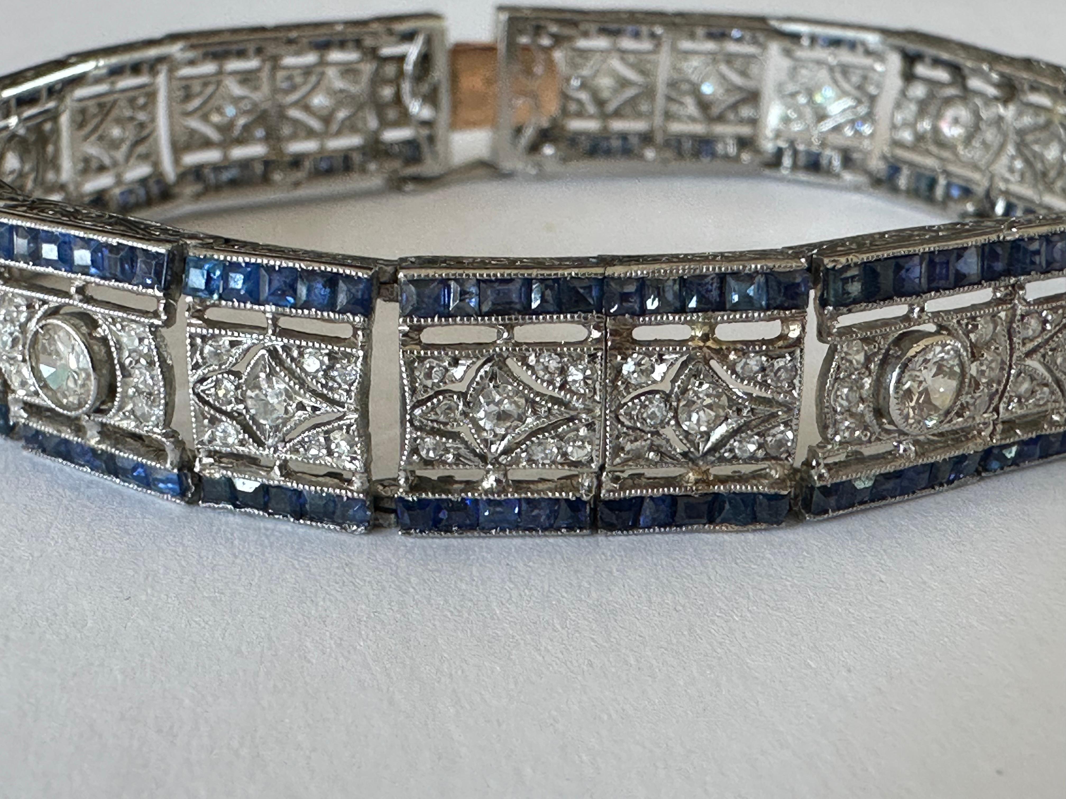 This spectacular platinum and 18K white gold bracelet embodies the sleek spirit of the Art Deco style. Approximately 4.0 carats of exquisite diamonds -- a mix of Old European-cut, single-cut, and rose cut diamonds -- are embedded in its streamlined
