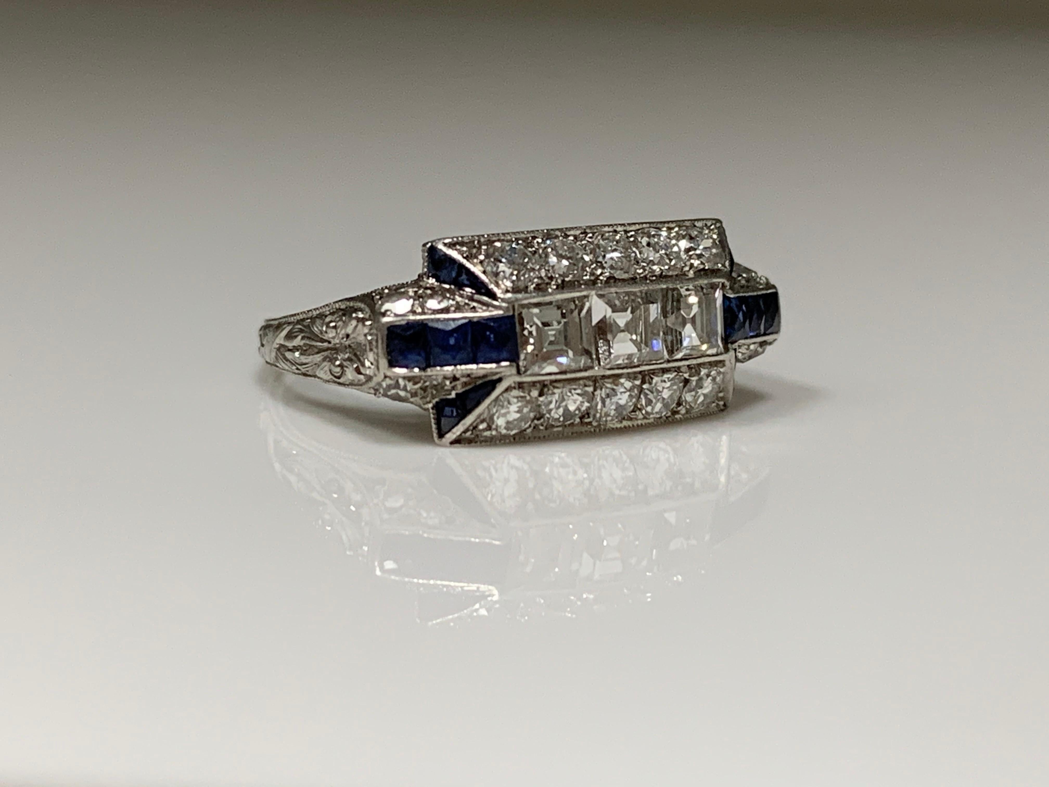 Emerald Cut Art Deco Diamond and Blue Sapphire Ring in Platinum For Sale
