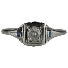 Art Deco Diamond and Blue Sapphire Three-Stone Engagement Ring
