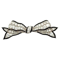 Art Deco Diamond and Caliber Onyx Platinum Vintage BOW Statement Brooch Pin