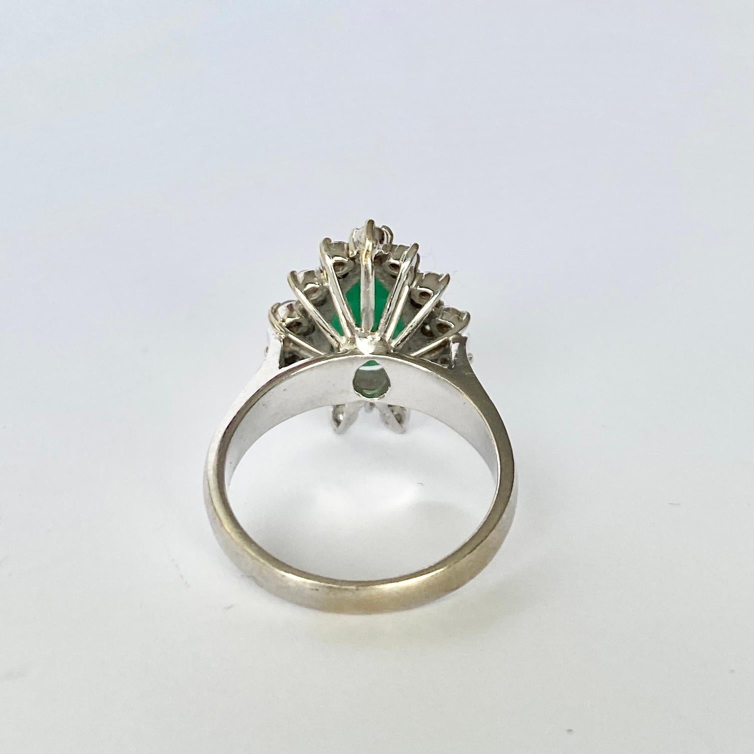 Pear Cut Art Deco Diamond and Emerald 18 Carat White Gold Ring