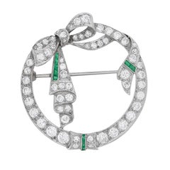 Art Deco Diamond and Emerald Circle Brooch, circa 1920s
