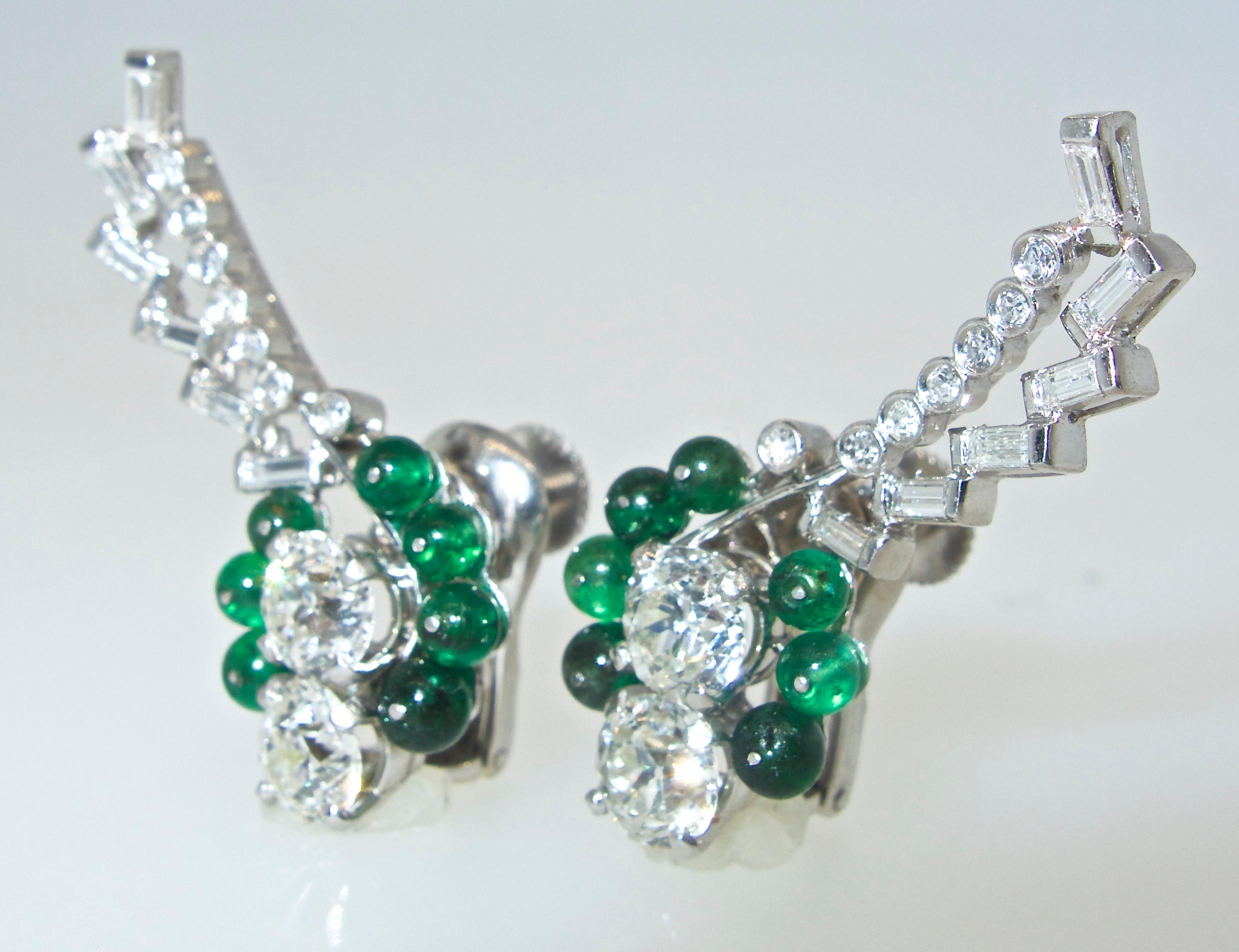 The 14 Colombian natural emerald beads are a vivid bright green color, all well matched. The four center European cut diamonds weigh approximately 3.0 cts.,  The six baguette cut diamonds weigh approximately .25 cts., the smaller round diamonds