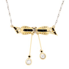Art Deco Diamond and Onyx Bow Necklace, circa 1920s