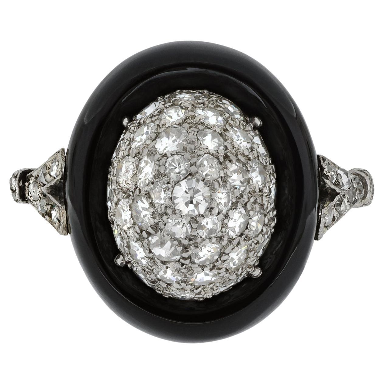 Art Deco diamond and onyx cluster ring, circa 1925. For Sale