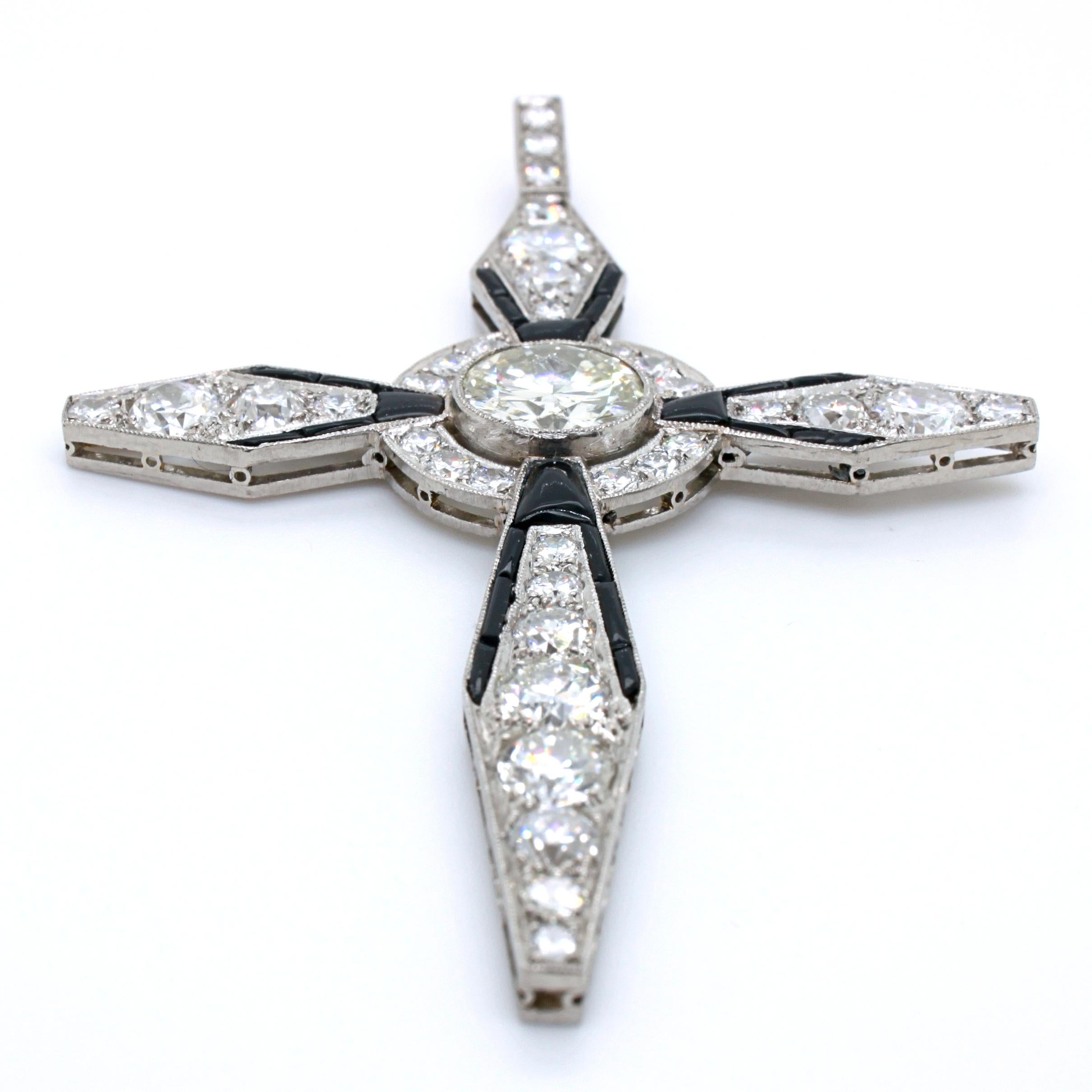 Round Cut Art Deco Diamond and Onyx Cross Pendant, circa 1920s