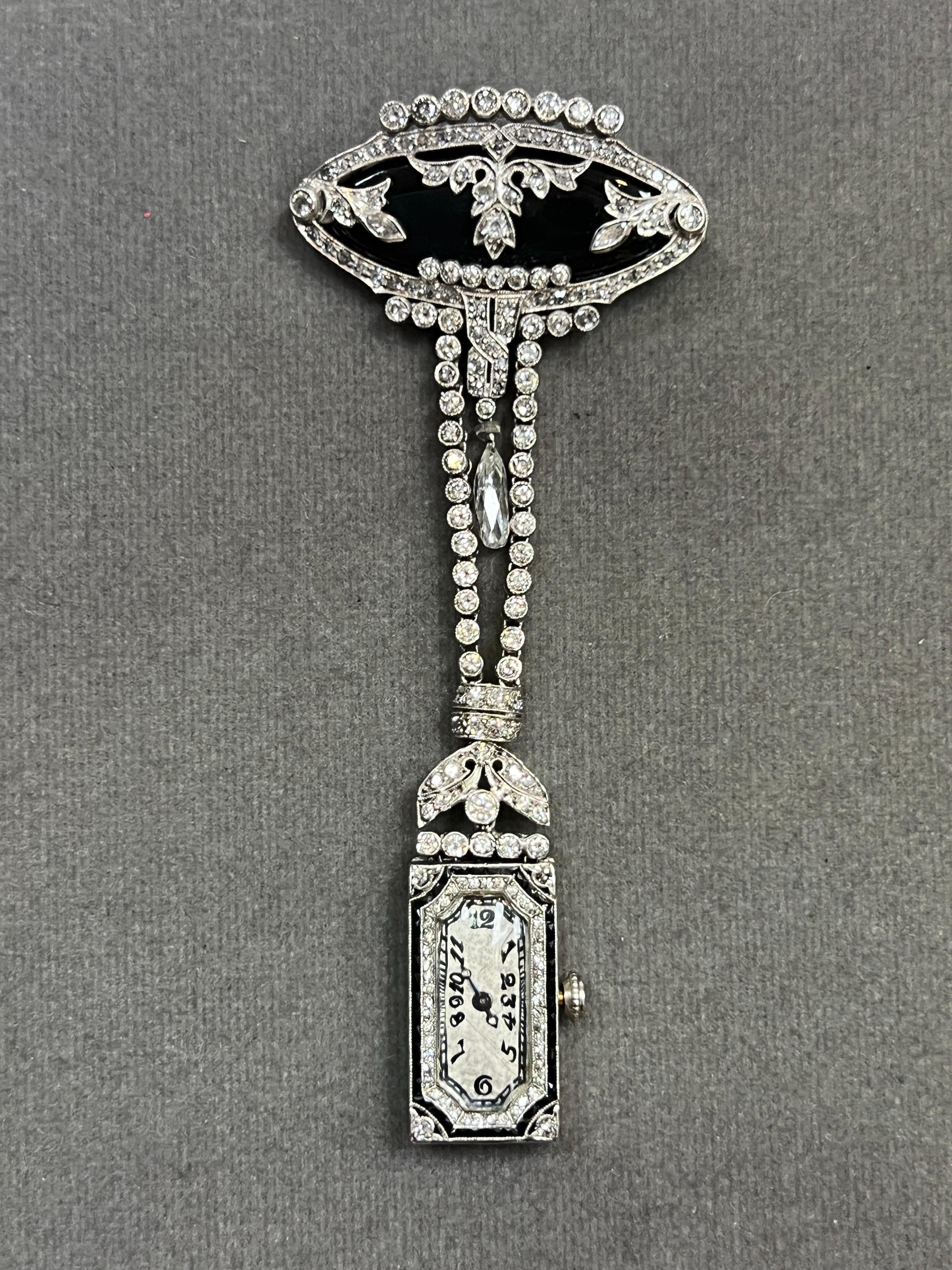 Art Deco Diamant und Onyx Ansteckuhr (Gemischter Schliff) im Angebot