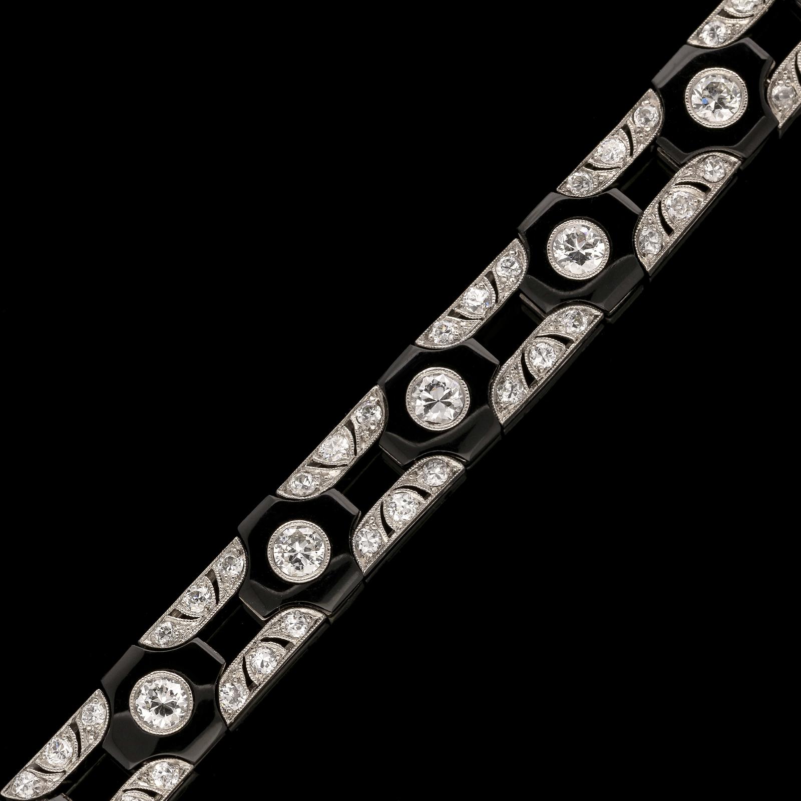 Round Cut Art Deco Diamond and Onyx Openwork Bracelet, Circa 1930's