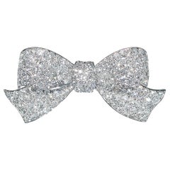 Art Deco Diamond And Platinum Bow Brooch, Circa 1925