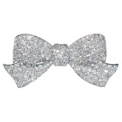 Spilla a fiocco in platino e diamanti Art Deco, CIRCA 1925