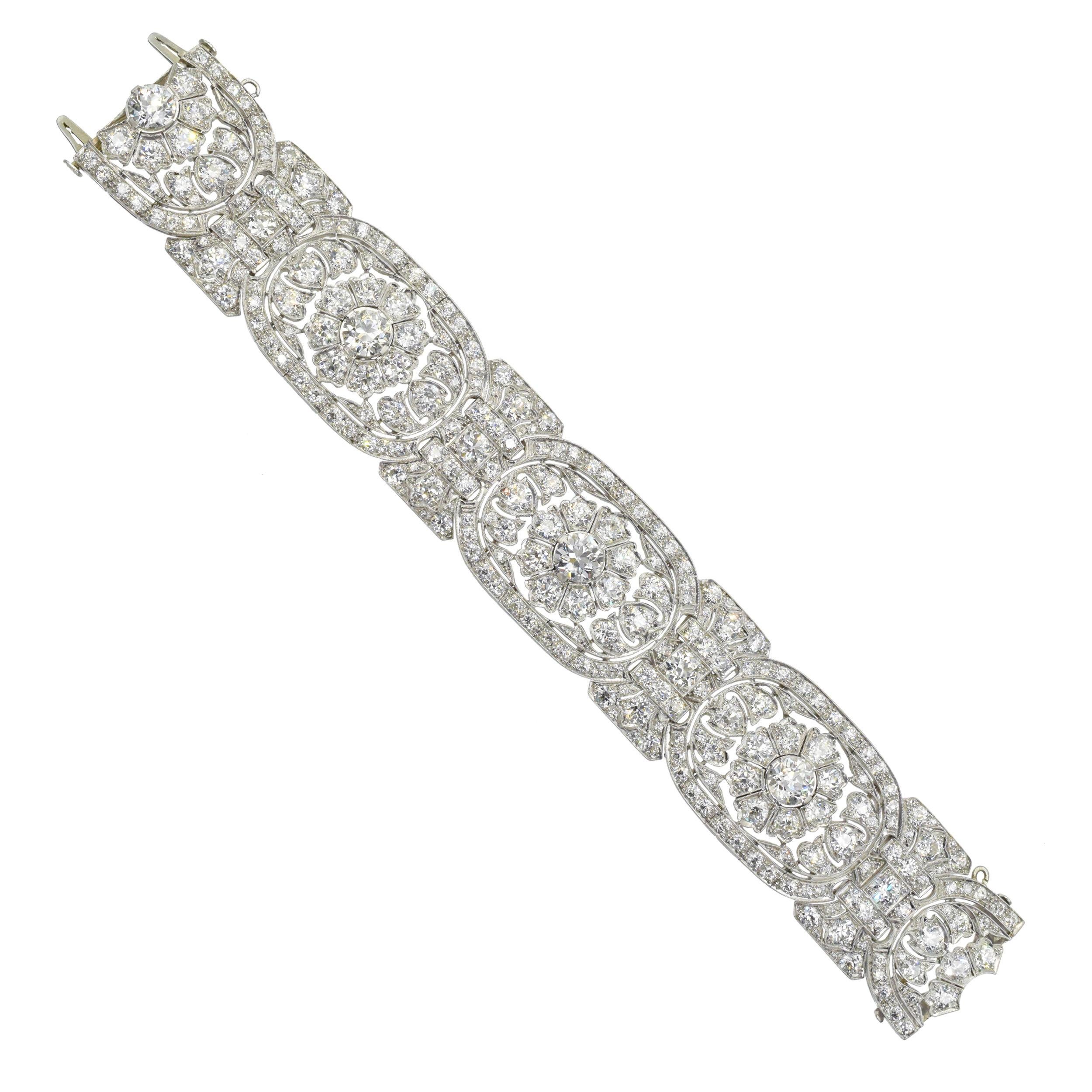 Art Deco Diamond  and Platinum Bracelet
This antique Art Deco bracelet has old european cut round diamonds weighing a total of approximately 40-45 carats of diamonds (inclusive of 4 old european cut round approx. 1 ct diamonds with GIA certificates)