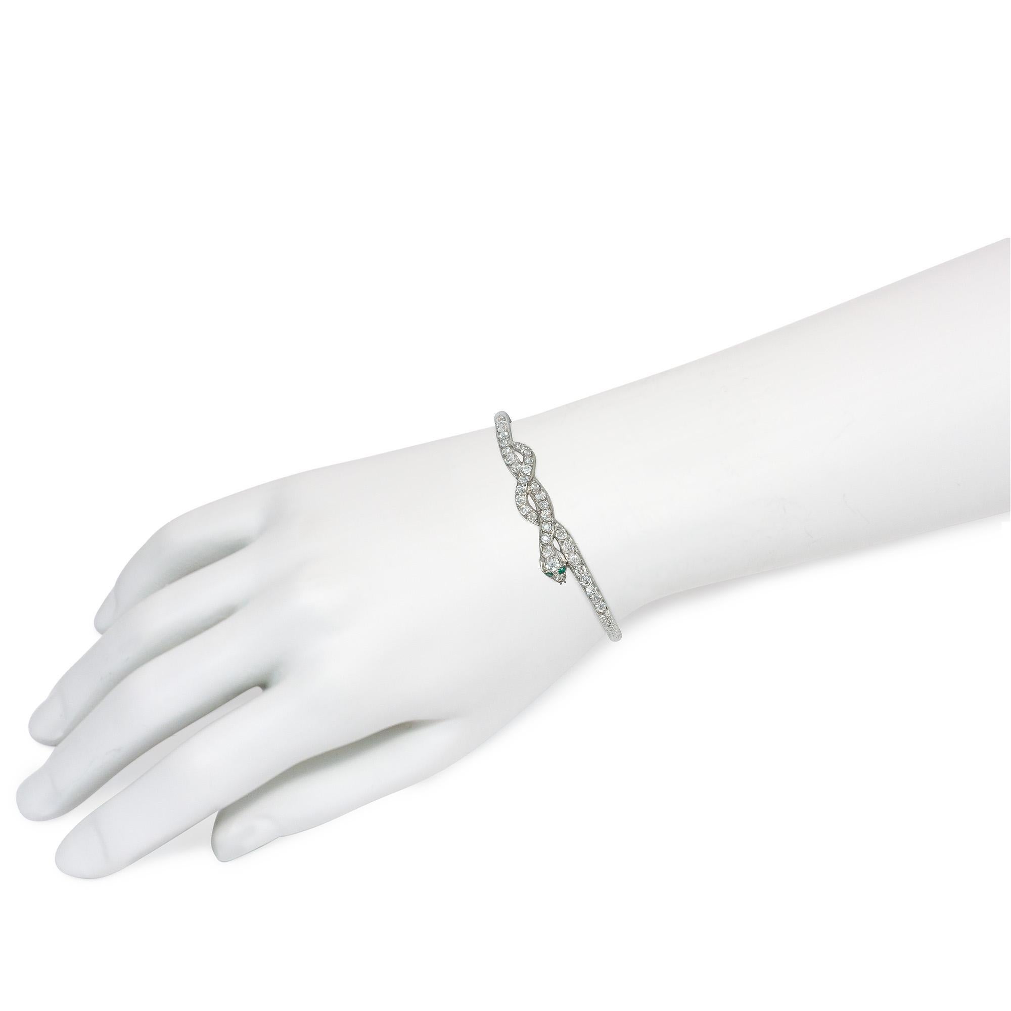 Art Deco Diamond and Platinum Entwined Snake Bracelet with Emerald Eyes In Good Condition For Sale In New York, NY