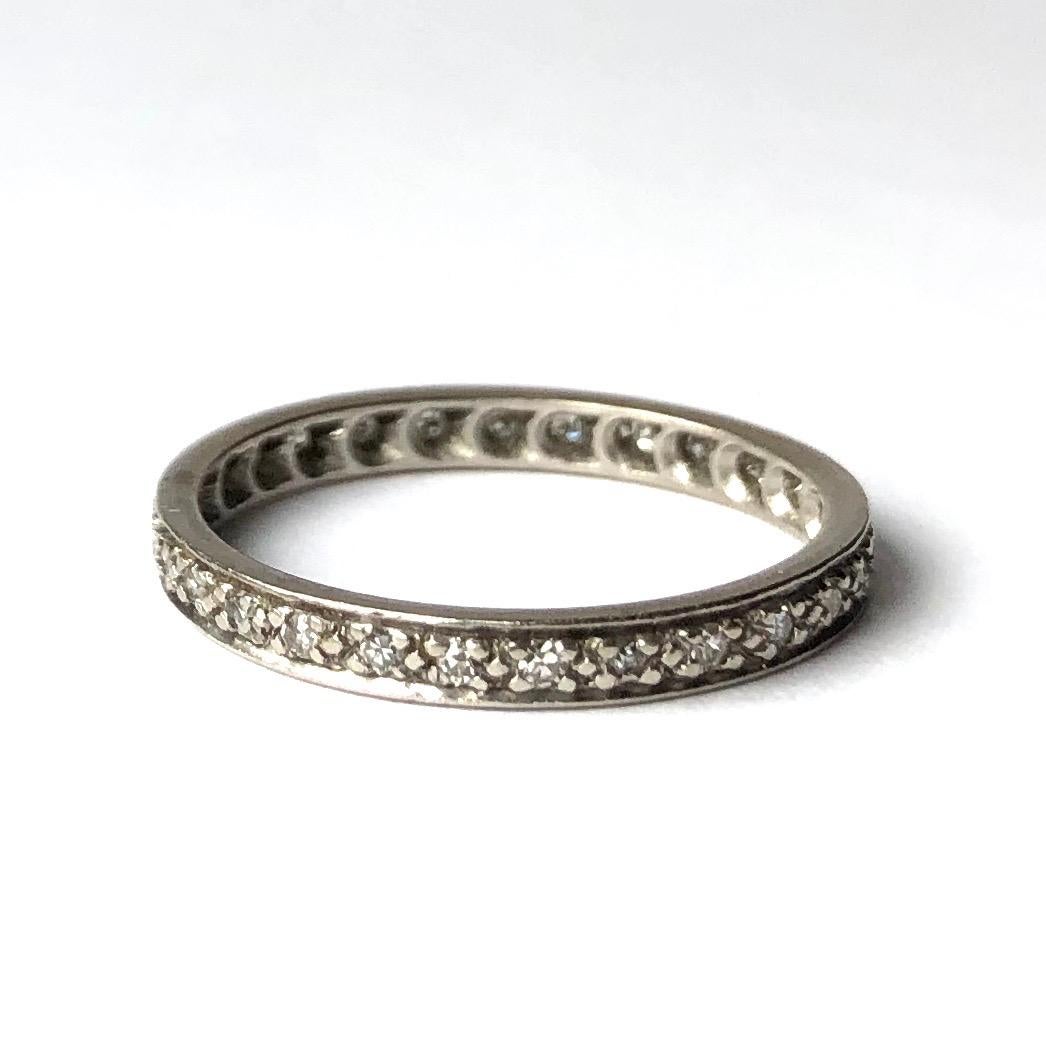 This classic diamond eternity would make a sparkly everyday wear or a fancy wedding band. Perfect to stack! The total weight of the diamonds is approx 30pts. 

Ring Size: N 1/2 or 7
Band Width: 2mm

Weight: 2.2g