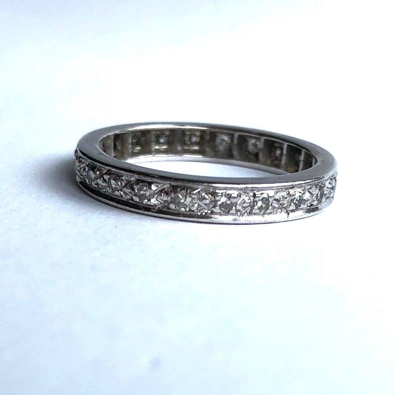 This classic diamond eternity would make a sparkly everyday wear or a fancy wedding band. Perfect to stack! Each Diamond is approx 3pts. 

Ring Size: N 1/2 or 7
Band Width: 2.5mm

Weight: 2.6g
