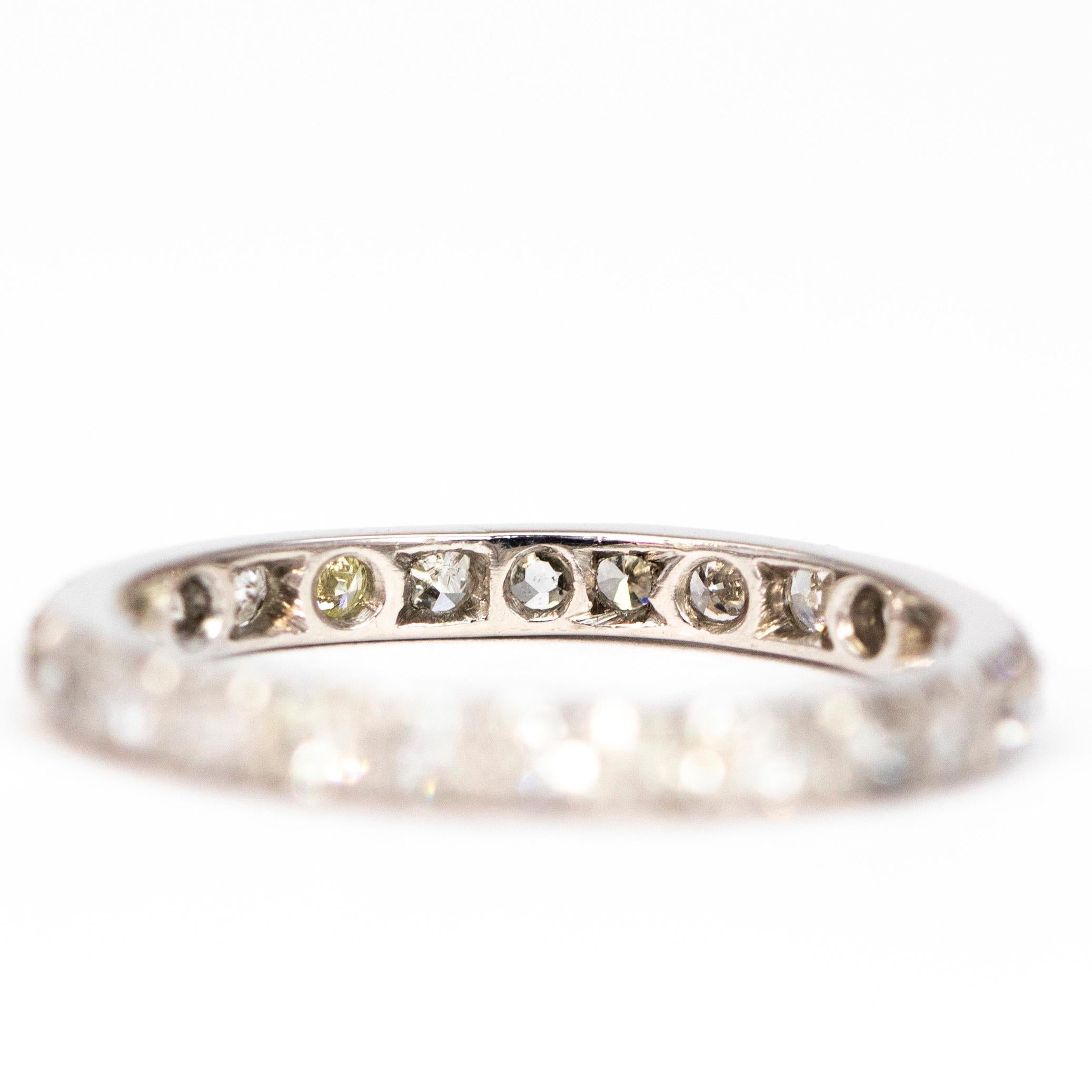 This shimmering eternity band holds diamonds which measure 5pts each and have the most wonderful sparkle. The diamonds are set within the band which is modelled in platinum.

Ring Size: Q or 8 1/4
Band Width: 2.5mm

Weight: 3g