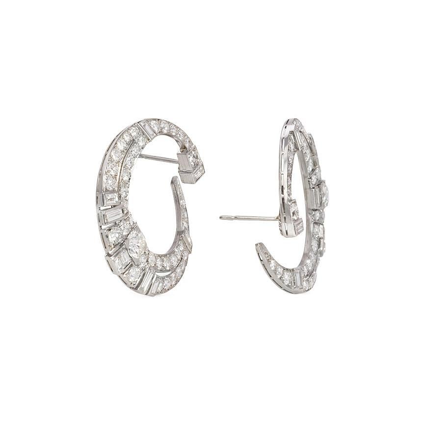 A pair of Art Deco diamond front-to-back hoop earrings of tapering design, set with round and baguette-cuts, in platinum.  Atw 6.00 cts.  In beautiful condition
