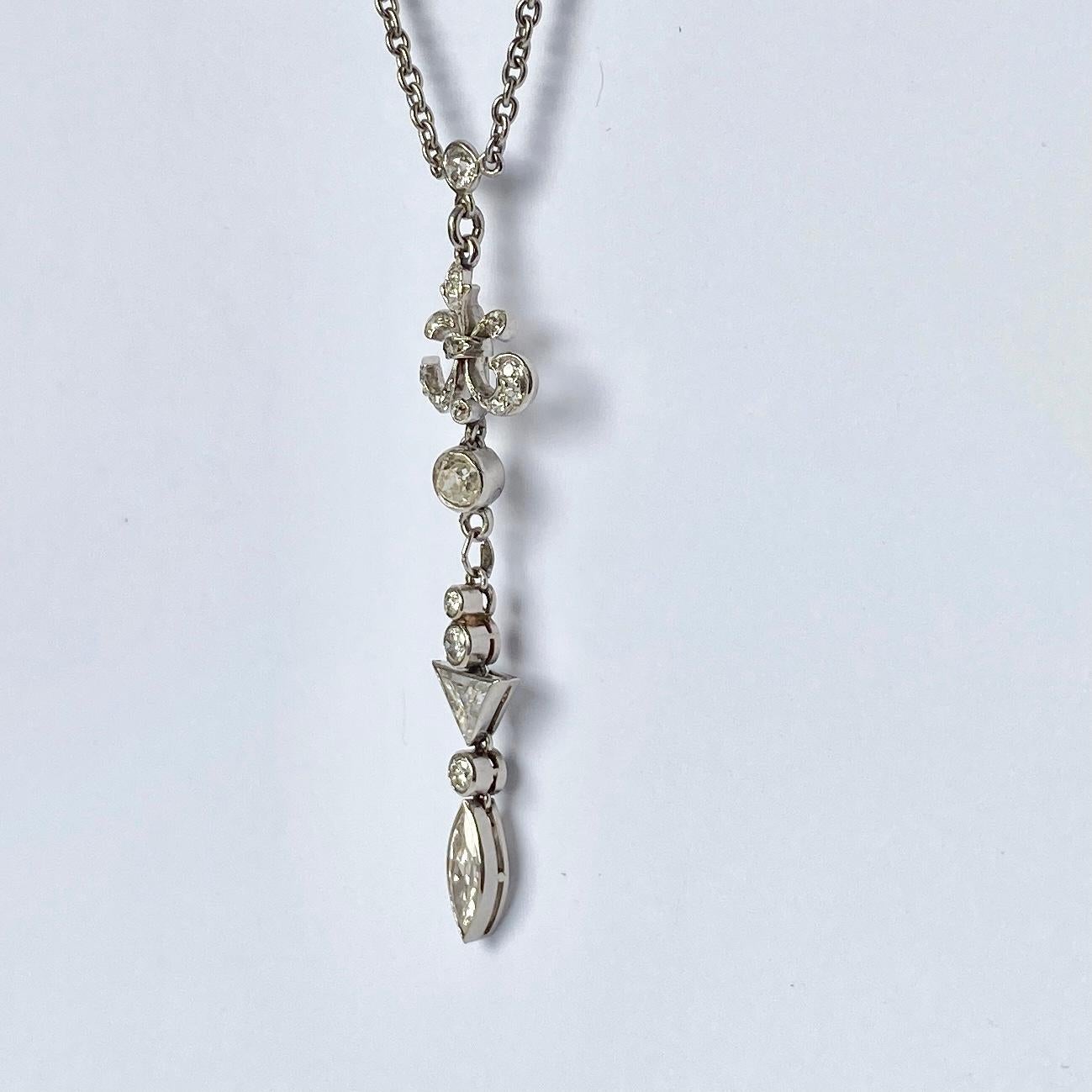 The diamonds in this gorgeous glittering pendant are bright and total approximately 1.9ct. Dotted perfectly around the chain are 10 diamonds which add such a beautiful sparkle. 

Length: 37cm
Drop Length: 5cm

Weight: 8.7g