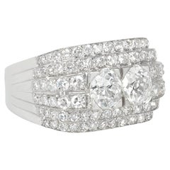 Antique Art Deco Diamond and Platinum Step Design Ring Centered by Old Mine Cut Diamonds