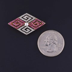 Art Deco Diamond and Ruby Greek Key Brooch of 18k Gold